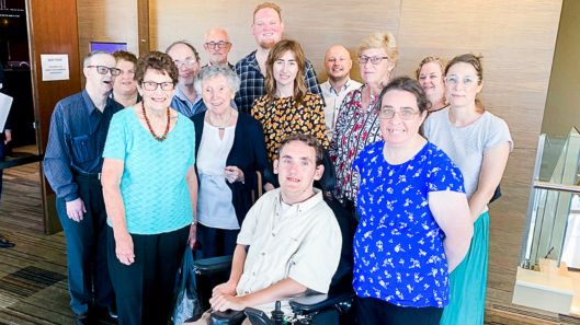 A group of CID members and staff at the Disability Royal Commission health hearing.