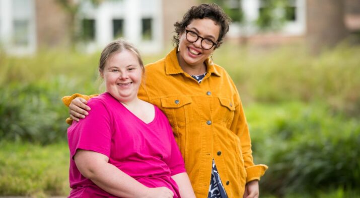 Two women with intellectual disability hanging out together.